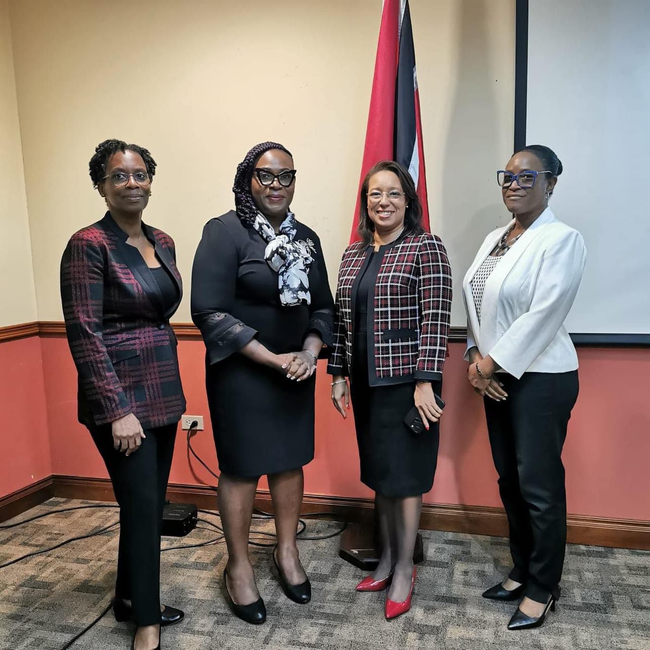 Officials from the Ministry of National Security and the Tobago House of Assembly, from left to right -  Mrs. Nataki Atiba-Dilchan, Mrs. Denese Toby-Quashie, Chief Administrator, Ms. Natasha Barrow and Dr. Simone Titus